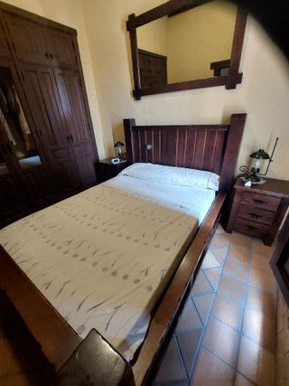 Dormitorio madera maciza