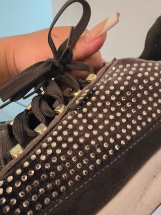 Bambas XTI negras y doradas