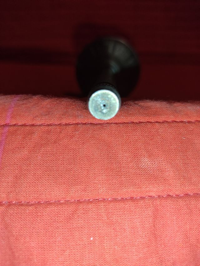 Rociador antiguo de metal