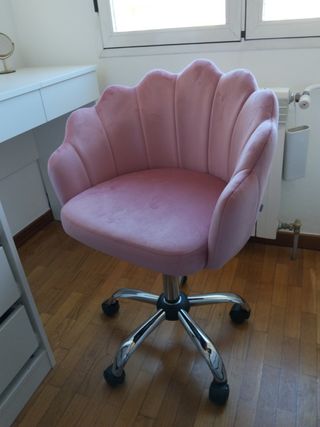 Silla giratoria rosa terciopelo.