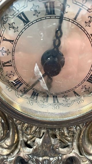 Reloj bronce antiguo ángel