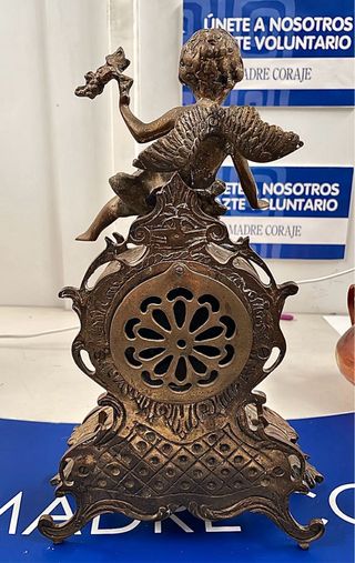 Reloj bronce antiguo ángel