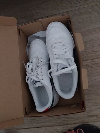 Zapatillas Puma blancas y negras