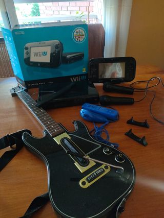 Wii U 32 GB+ 13 juegos +guitarra guitar Hero 
