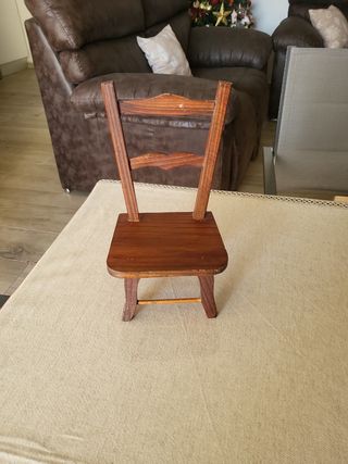 Muñeca porcelana antigua con silla