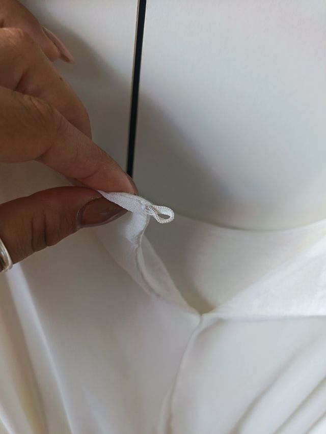 Abito bianco maniche a balze