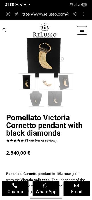 Colmillo oro con diamantes negros