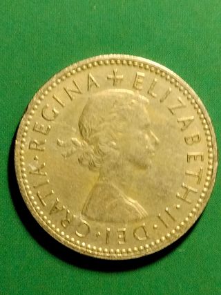 moneda de un chelín de Inglaterra del año 1957