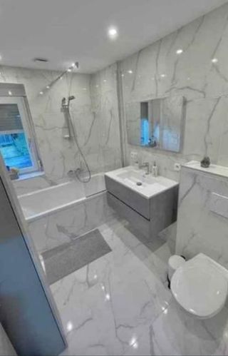 Baño reformado: Moderno y elegante