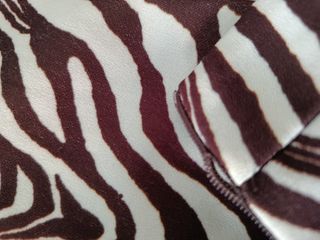 Pantalones campana cebra marrón blancos