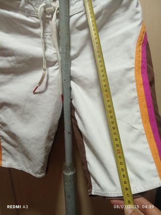 Bañador Roxy marrón-blanco y detalles naranja