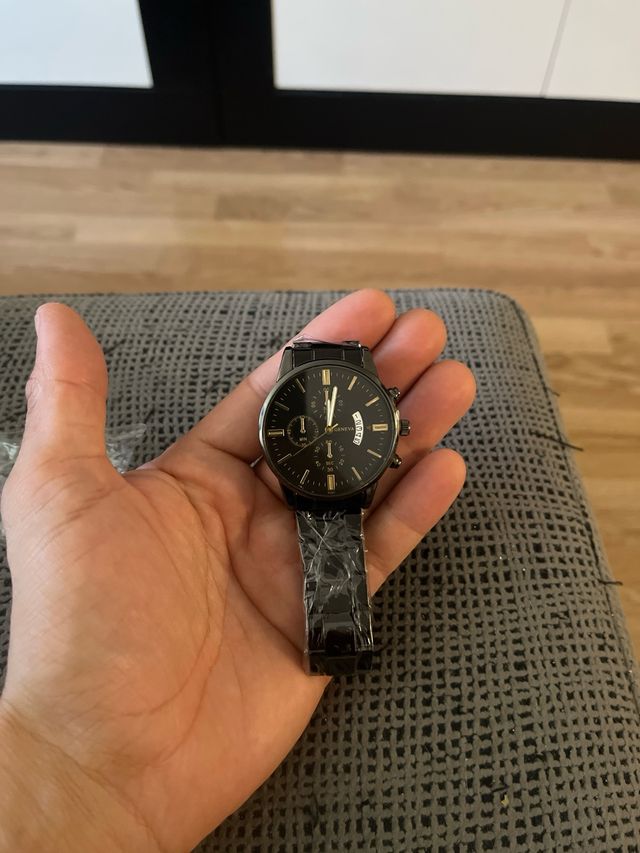 Reloj GENEVA negro y dorado