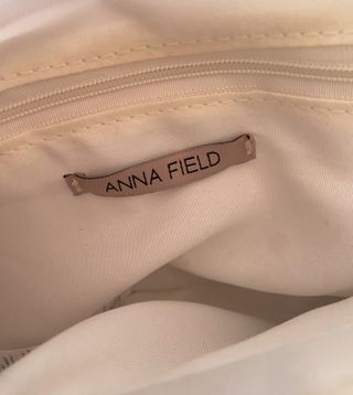 Bolso blanco de mano o colgado