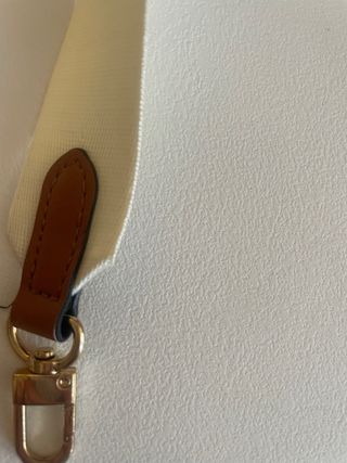 Bandolera beige y marrón