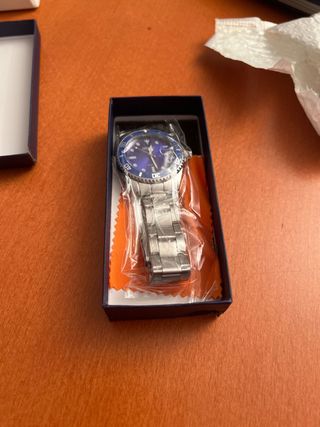 Reloj deportivo azul y plata