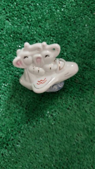 Figura de Elefantes de la suerte en avión