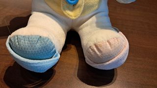 Cagnolino di peluche Chicco con sonagli