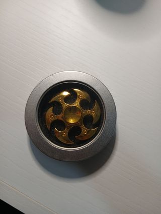 Spinner metálico dorado