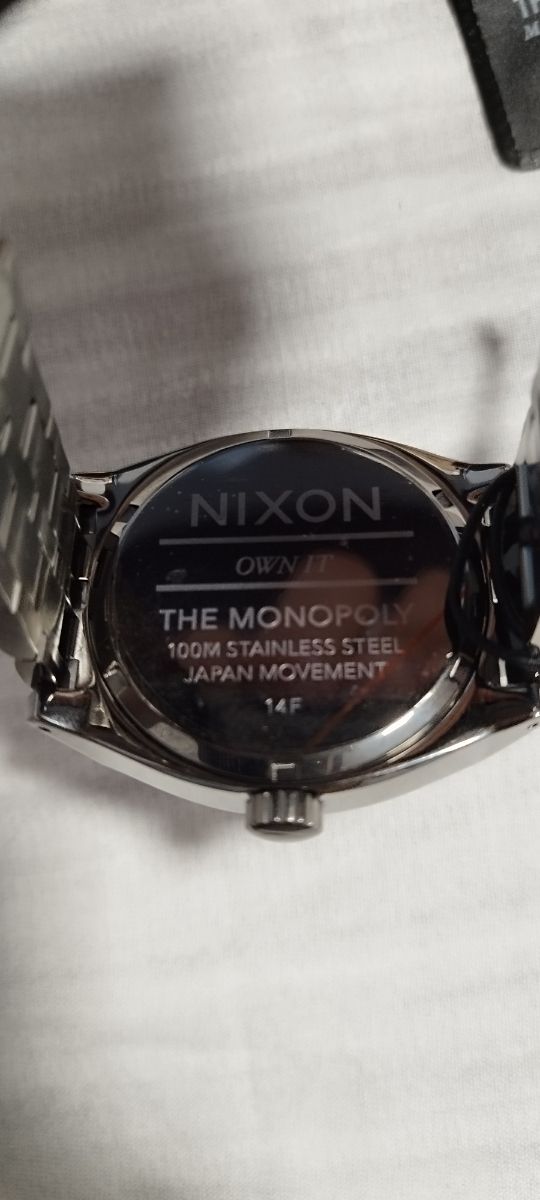 Reloj Nixon Monopoly - Negro y Morado