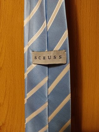 Corbata Schuss azul y blanca a rayas
