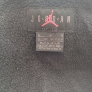 Sudadera Nike Jordan negra y dorada