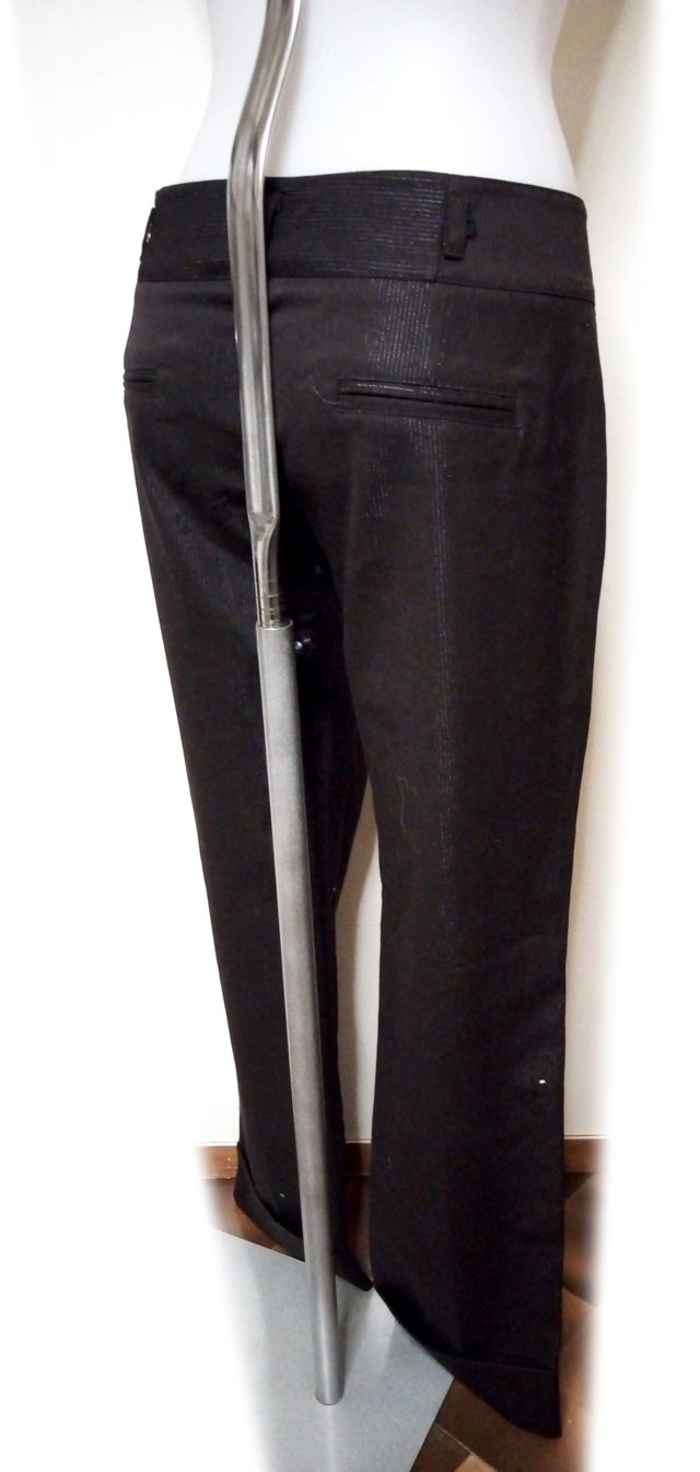 KORALLINE Pantalone largo con risvolta