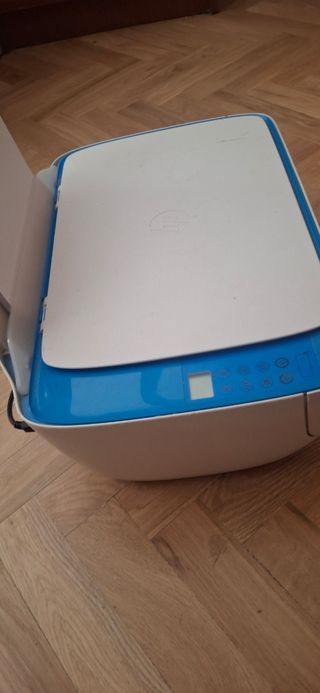 Impresora HP multifunción blanca y azul