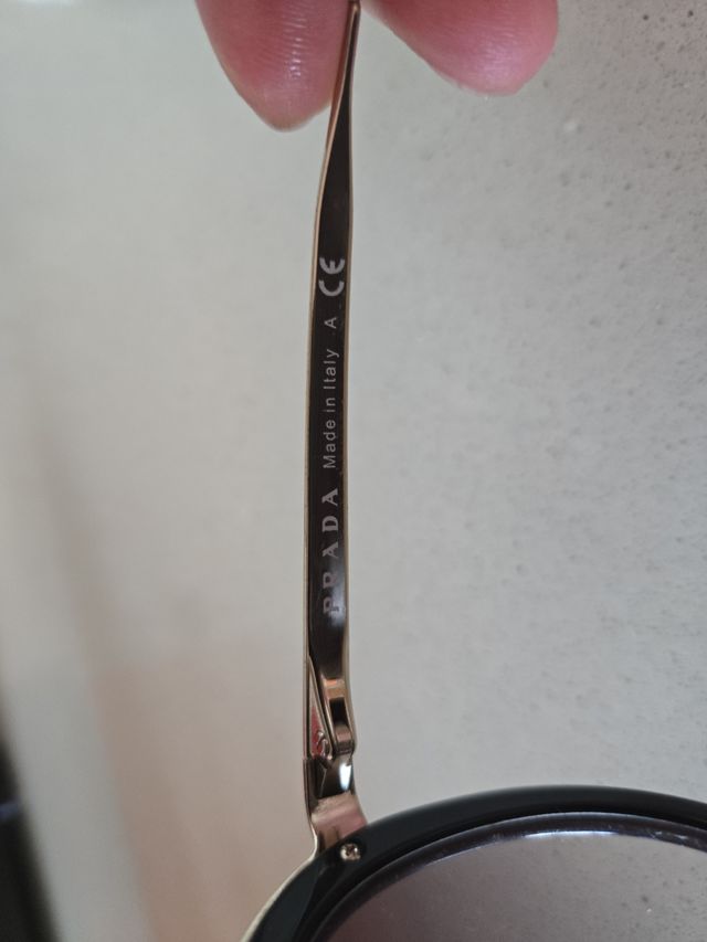 Gafas Prada vintage redondas con su funda y caja