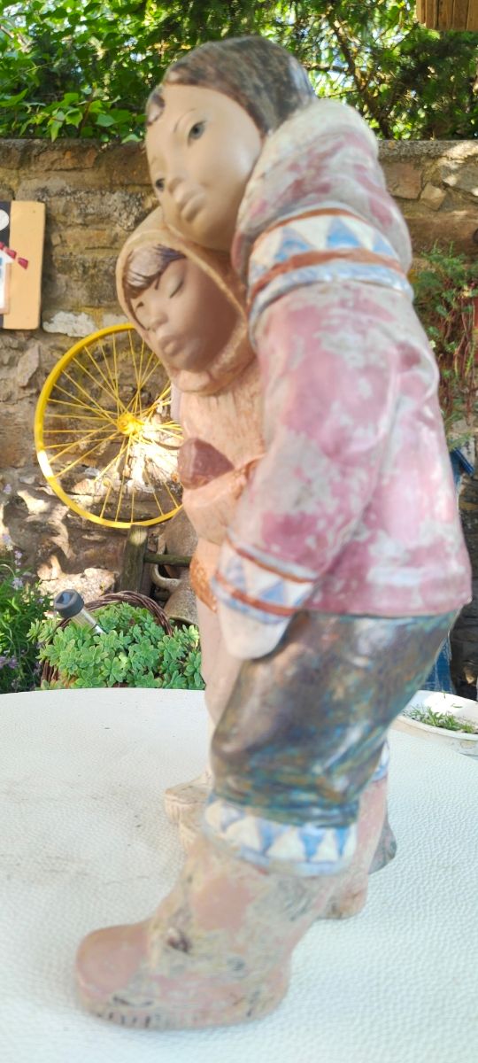 Niños esquimales de porcelana