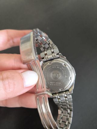 SEIKO Modelo SQ 100 acero dorado y plateado