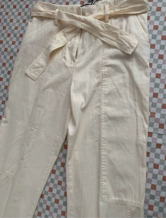 Pantalón anchoTintoretto color crema c/cinturón.