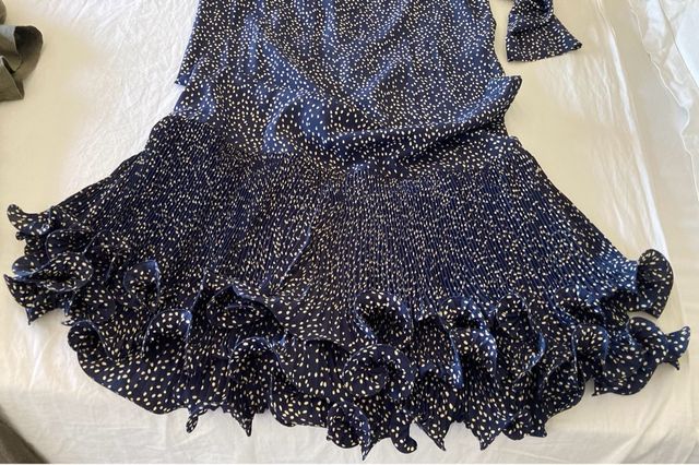 Abito elegante blu con pois bianchi