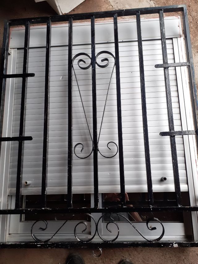 Reja y venta a con sus gristales y con todos sus 