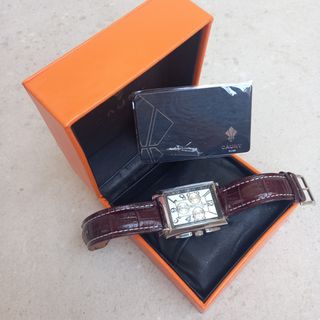 Reloj Cauny marrón y plata