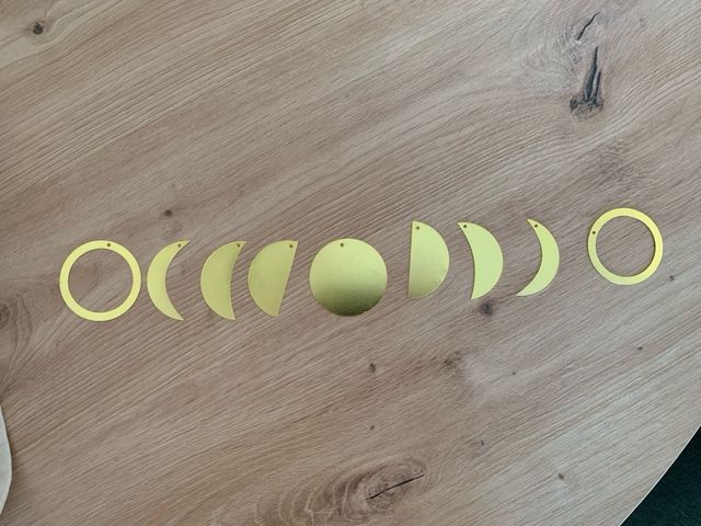 Decoración pared fases lunares dorado