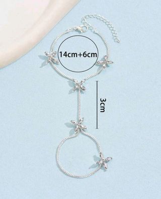 Pulsera mano plata flores