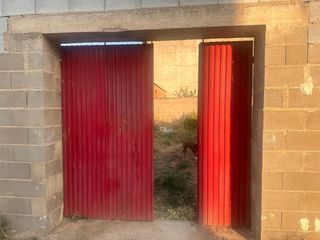 Puerta roja cochera - 4 hojas