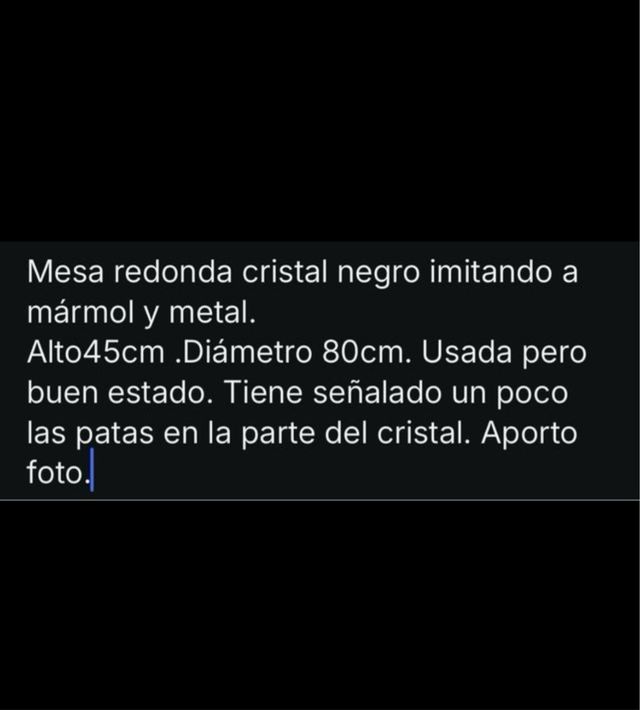 Mesa centro redonda negra y plata