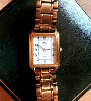 RELOJ LOTUS DE PULSERA. DORADO ACERO INOXIDABLE