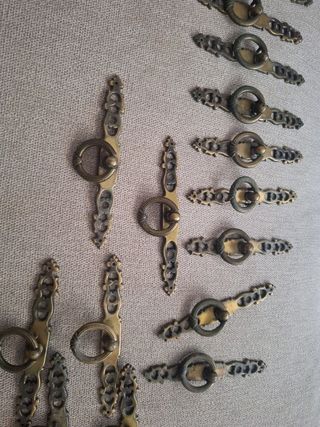 18 Tiradores cajones metal dorado