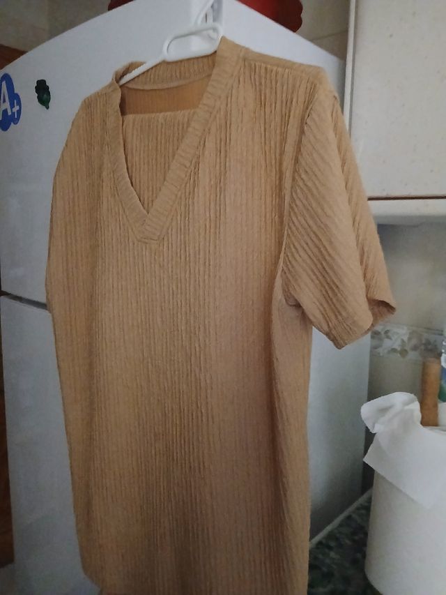 2 Conjuntos pantalón . Tono tostado y otro negro.