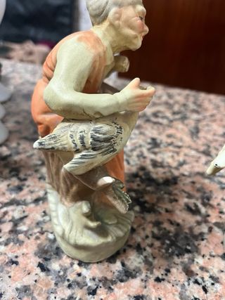 Pareja figuras ancianos ocas