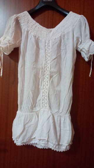 Blusa bianca copricostume