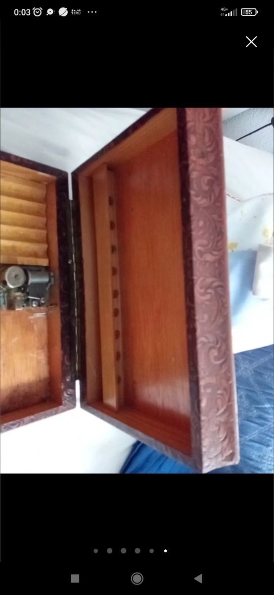 Scatola musicale intagliata