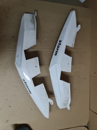 Laterales traseros Storm 125
