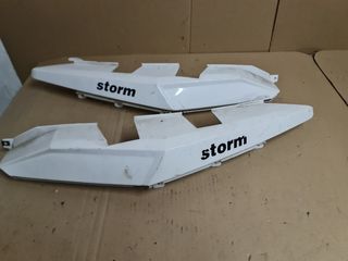 Laterales traseros Storm 125
