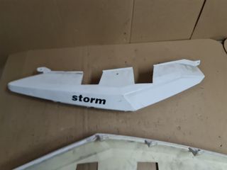 Laterales traseros Storm 125