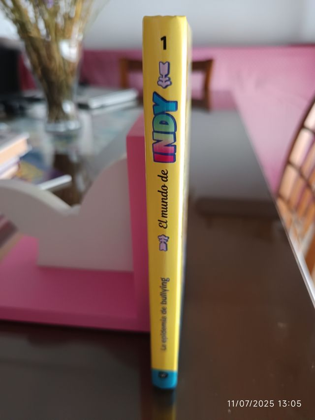 Sujeta libros mariposas