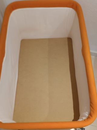 Minicuna bebé naranja de la marca Miny