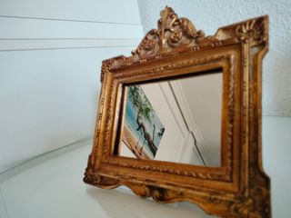 Espejo dorado antiguo